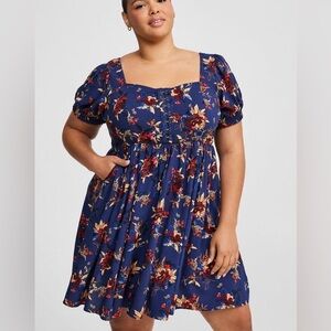 Torrid dress dark blue with flowers
Brand new with tags